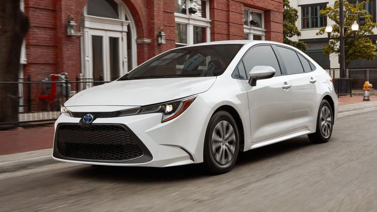 2023 Toyota Corolla Hybrid in white.